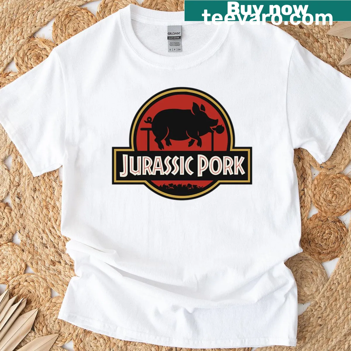 Funny T-shirt featuring a cartoon graphic of dinosaurs and BBQ. — on a men's t-shirt
