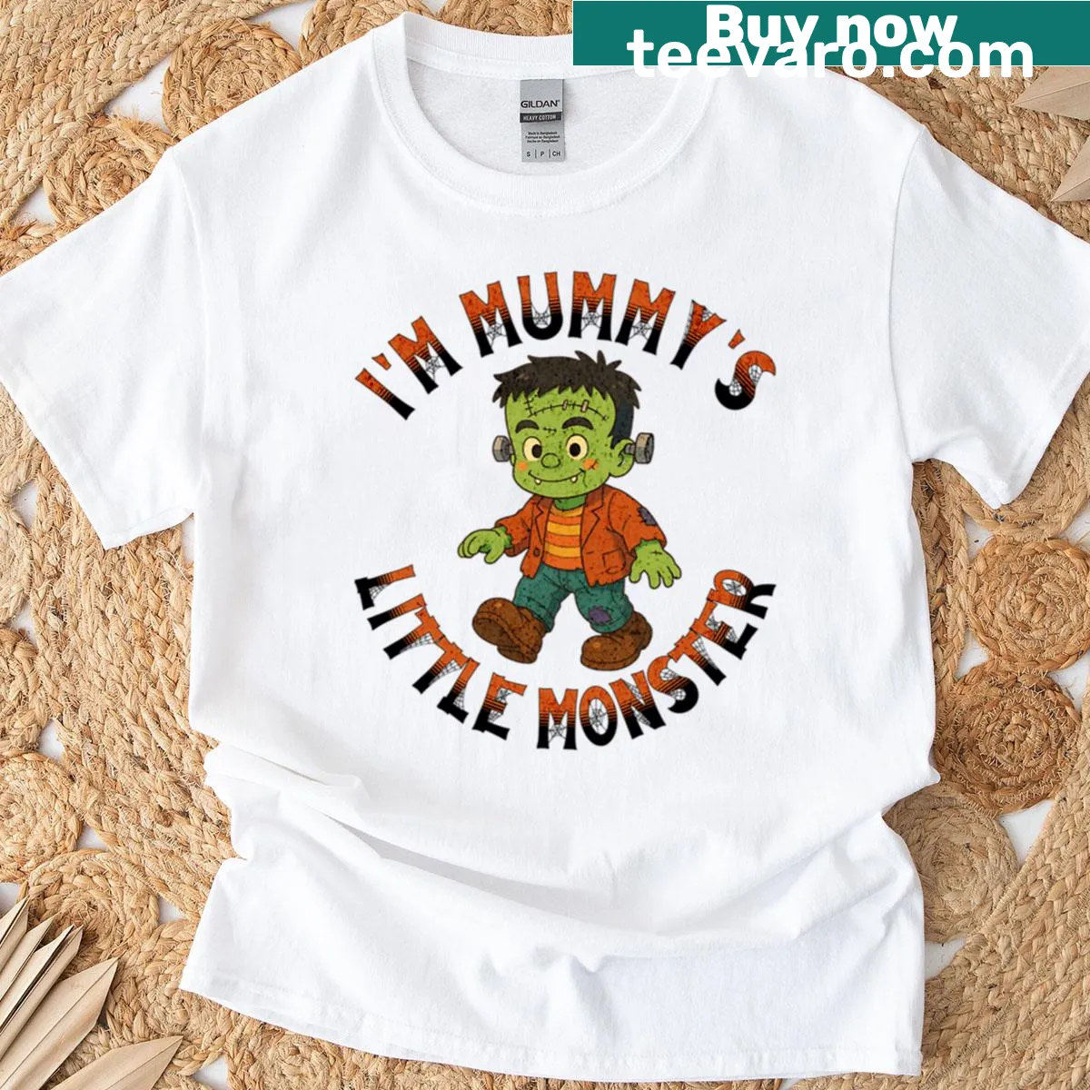 Cartoon design of a monster with text 'Mummy's Little Monster' — on a men's t-shirt