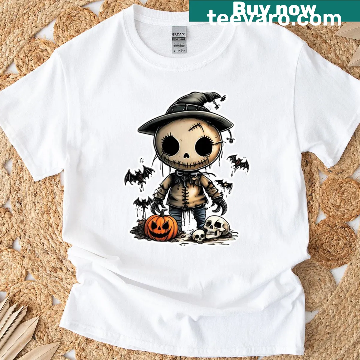 Oversized Halloween shirt featuring a gothic pumpkin scarecrow design. — on a men's t-shirt