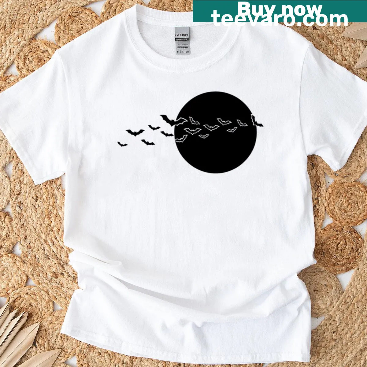 Vintage-style Halloween T-shirt featuring bats and a moonlit sky — on a men's t-shirt