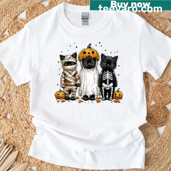 Retro Halloween t-shirt featuring a black cat, witch, and pumpkin design