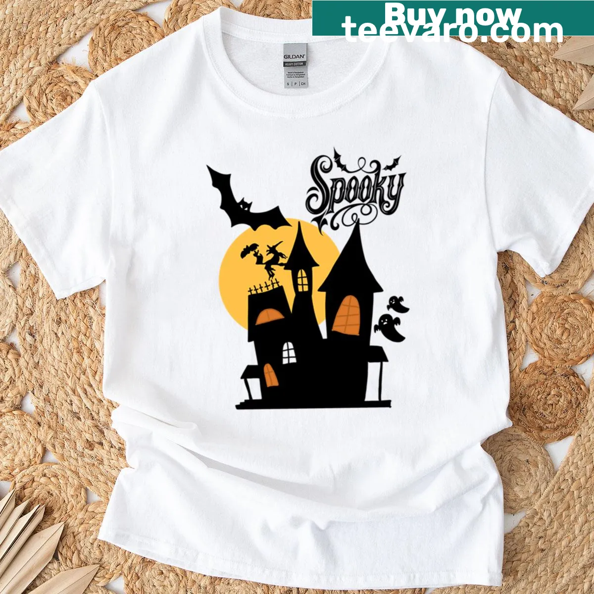 Vintage haunted house design for Halloween t-shirt — on a men's t-shirt