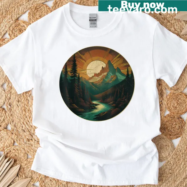 Vintage graphic T-shirt depicting a sunset over mountains and evergreen trees