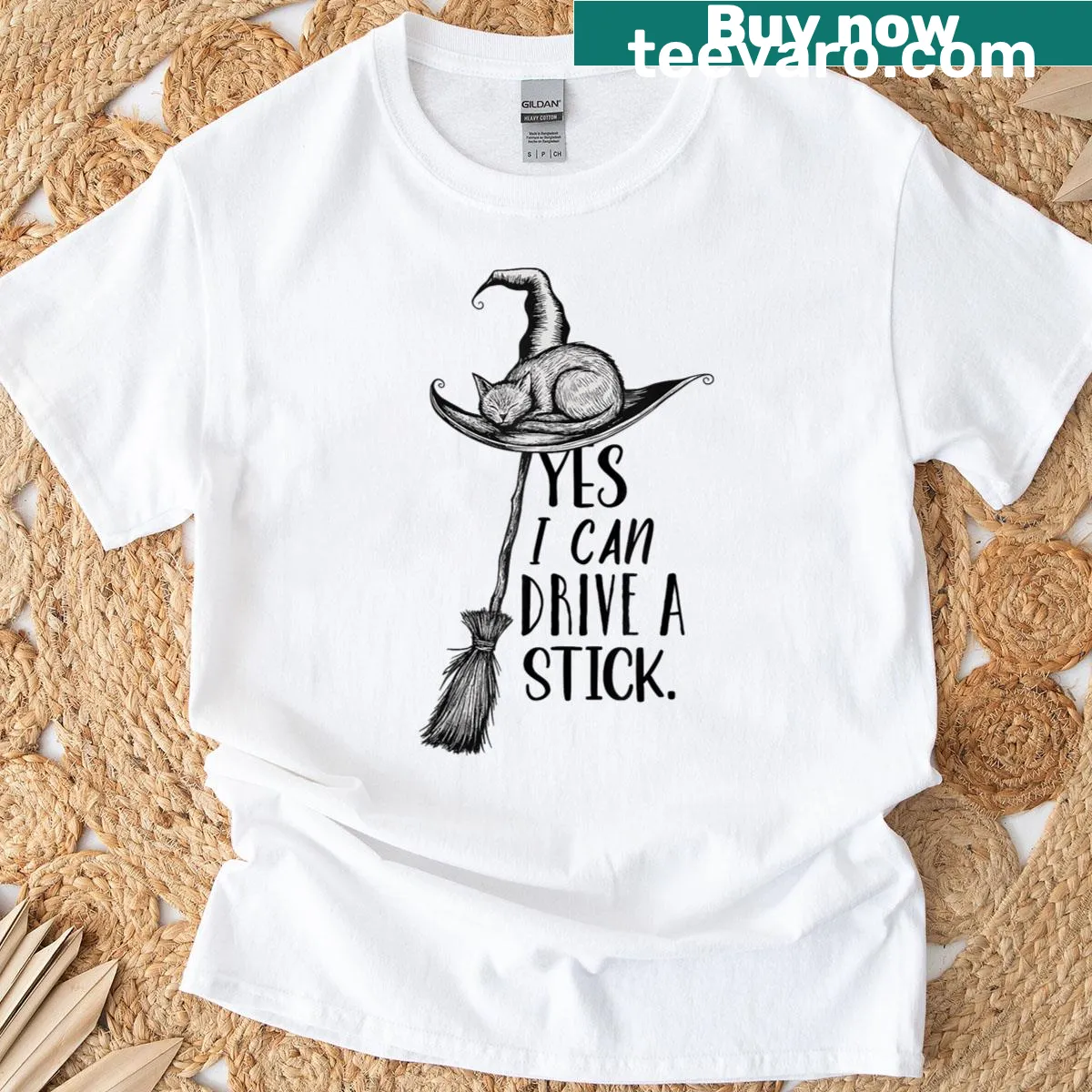 Funny Halloween T-shirt with witch graphics and driving pun — on a men's t-shirt