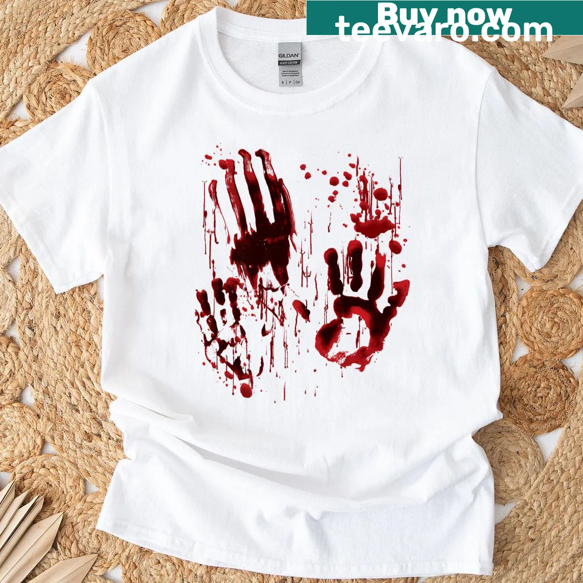 Grunge-style zombie t-shirt with blood splatter and bloody handprint graphic — on a men's t-shirt