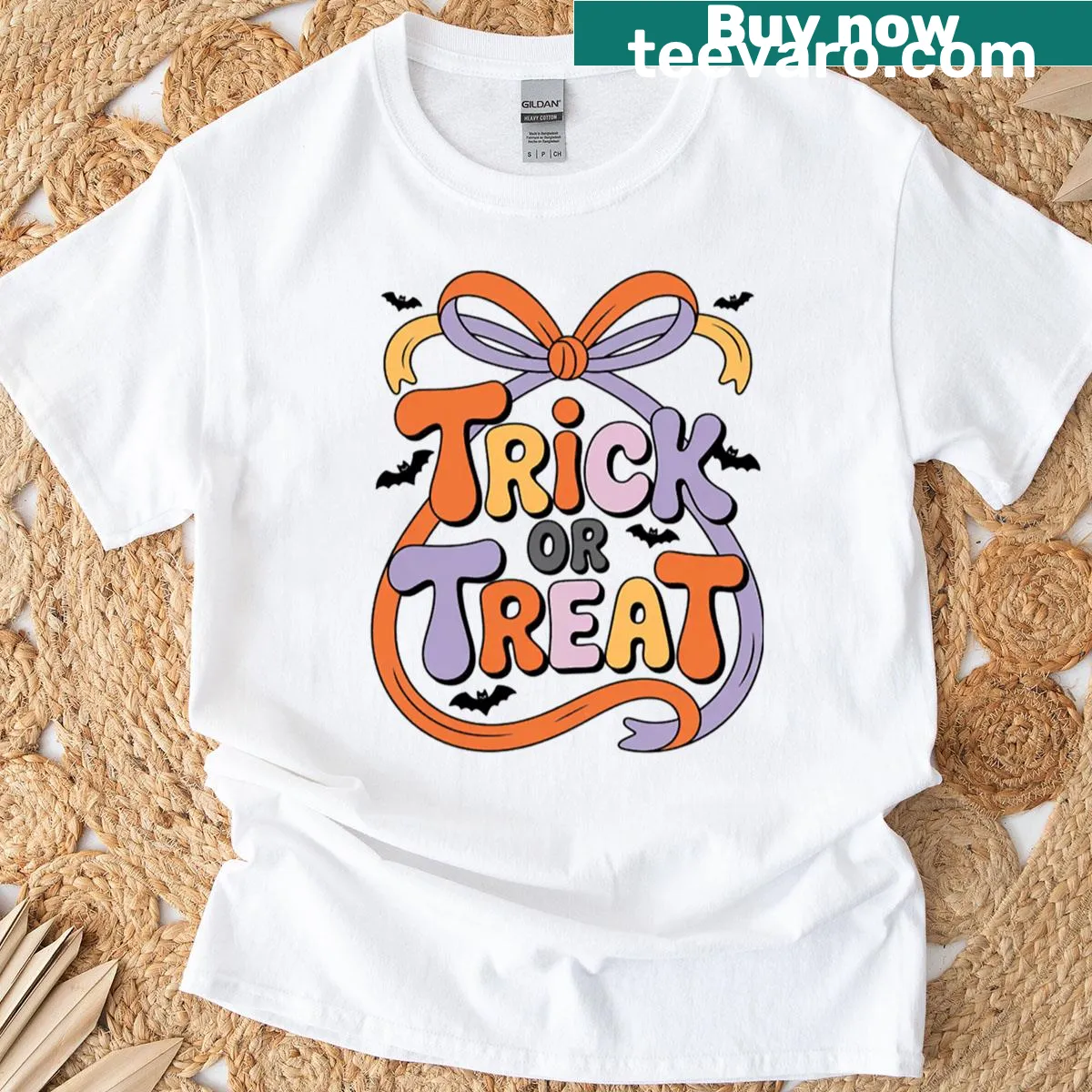 Halloween teacher t-shirt with spooky neon bow graphic — on a men's t-shirt