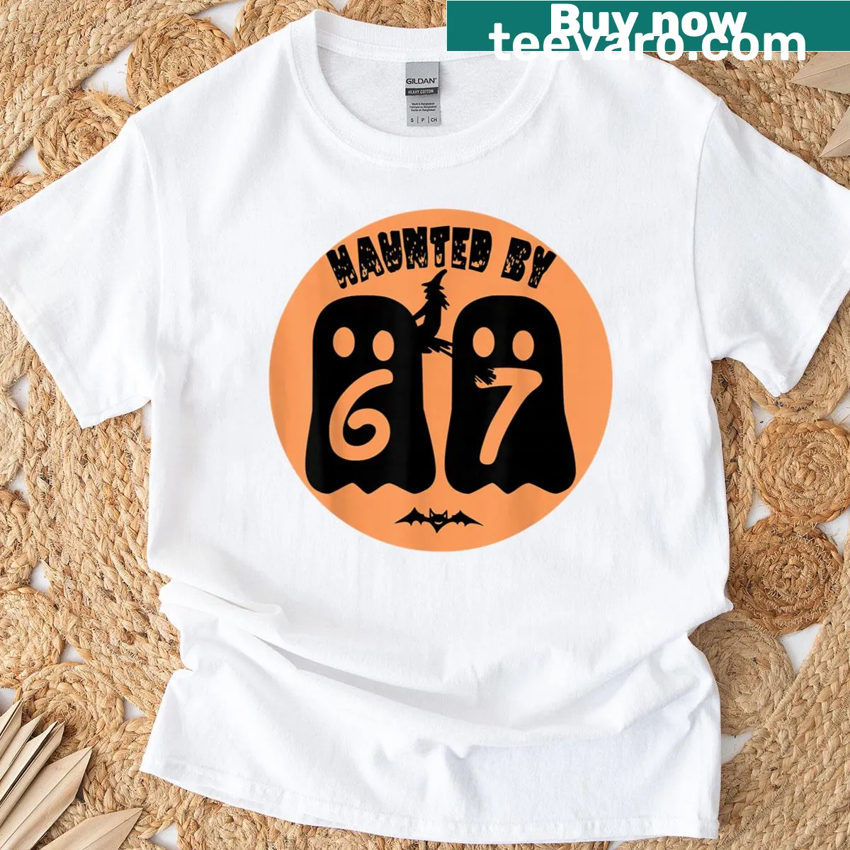 Funny ghost and pumpkin design titled 'Haunted By 67' for Halloween — on a men's t-shirt