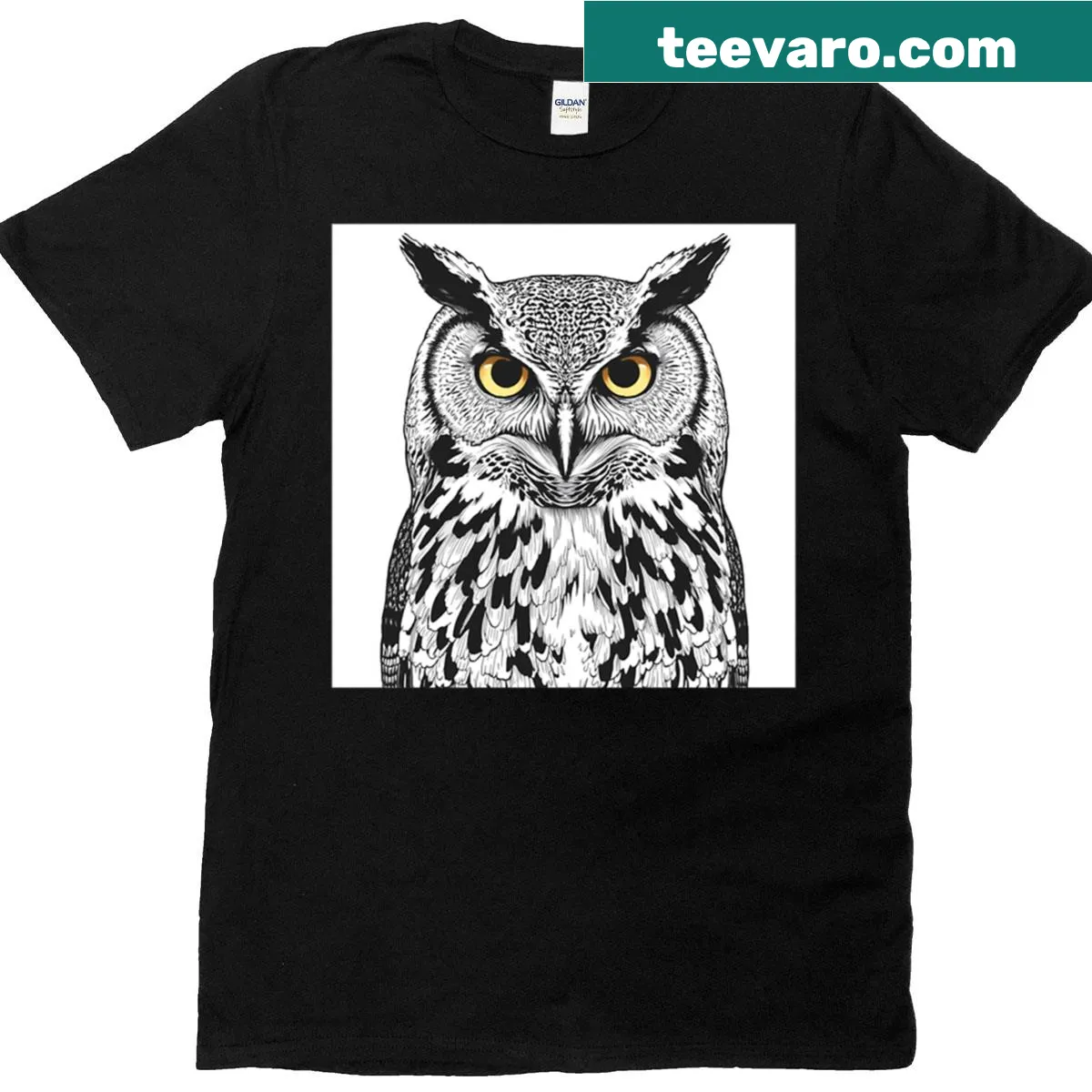 Black and white detailed illustration of an owl's intense gaze on a t-shirt — on a men's t-shirt