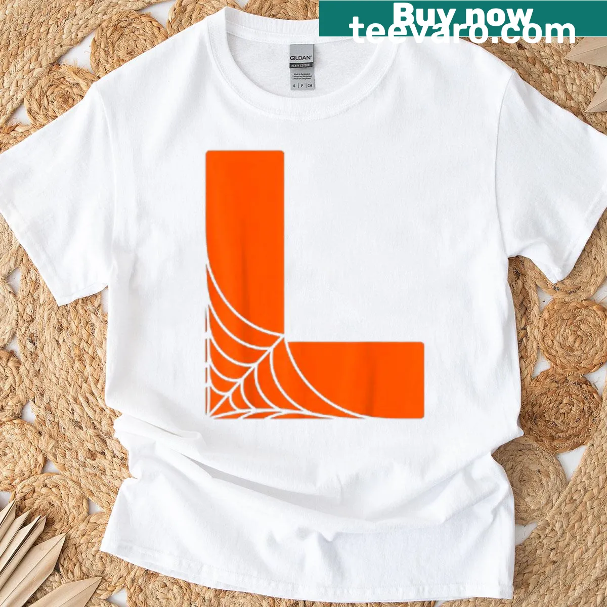 Letter L design with spider web graphics for Halloween shirt — on a men's t-shirt