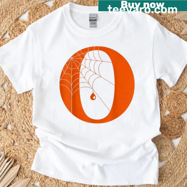 T-shirt featuring the letter O surrounded by spider webs
