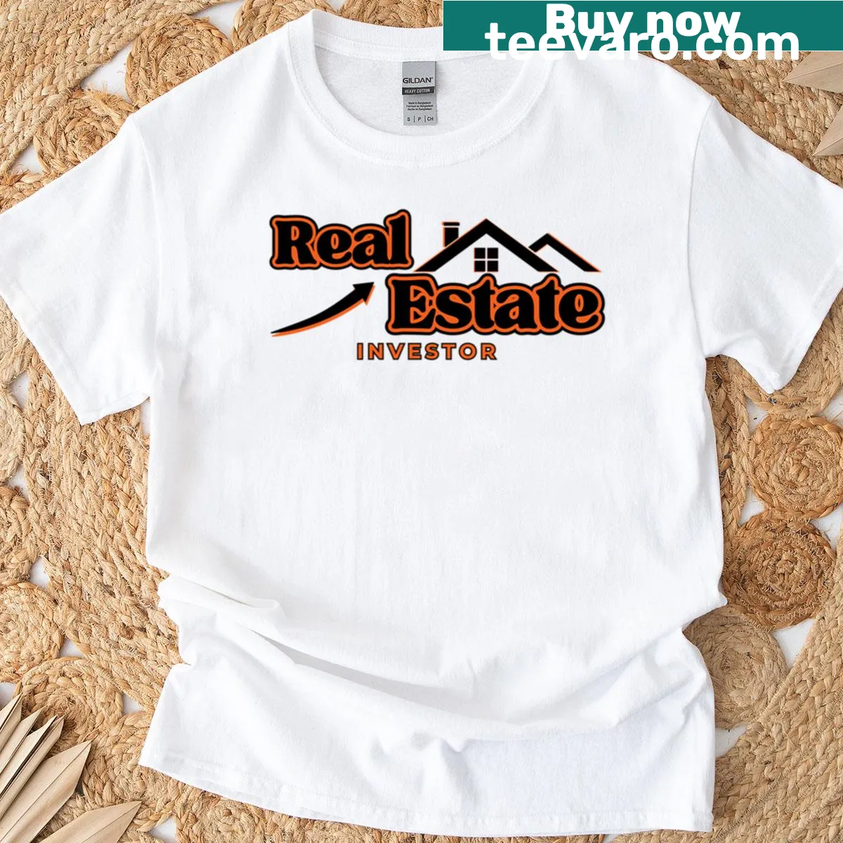 Bold T-shirt for real estate investors with a wealth-building message. — on a men's t-shirt