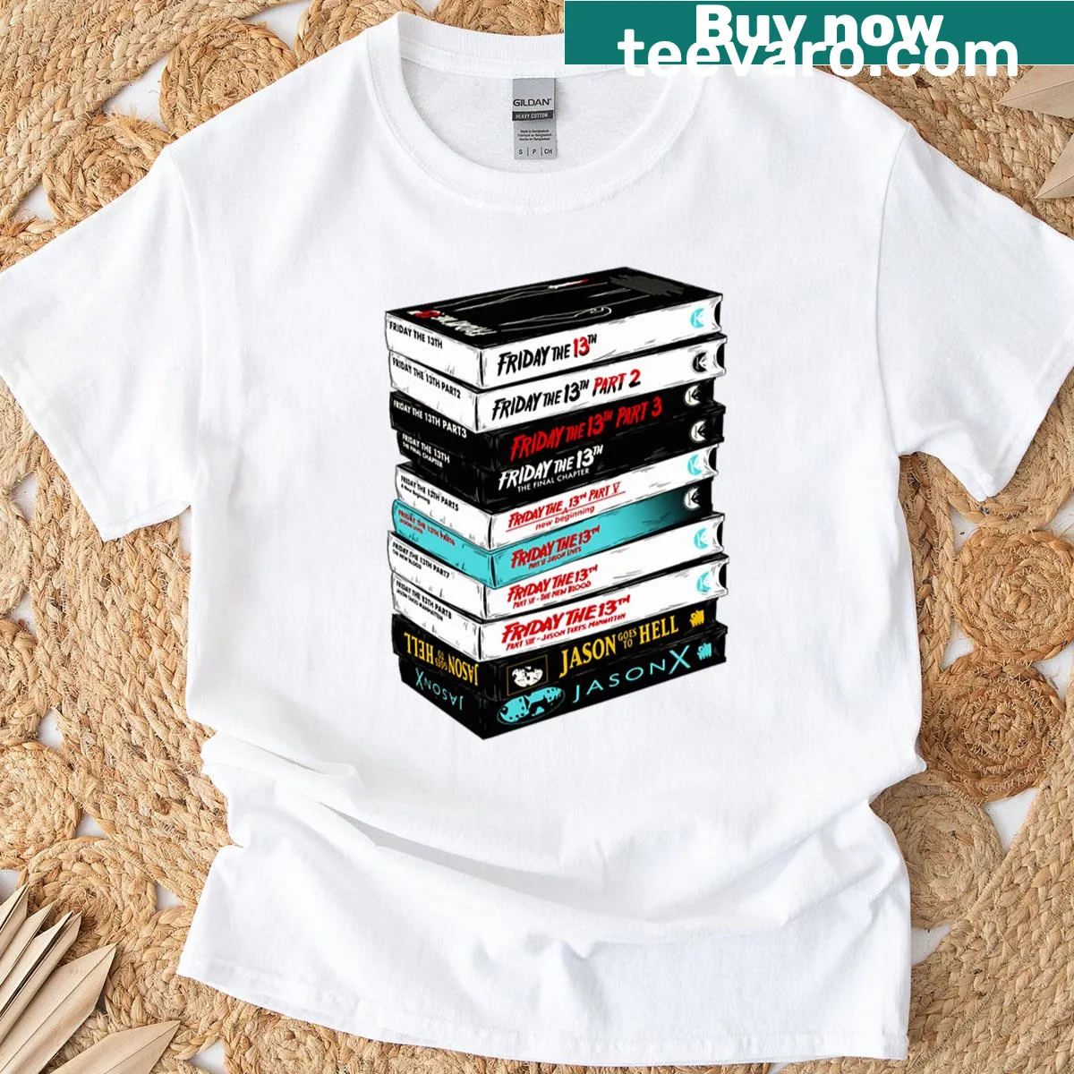 Graphic of a stack of retro slasher VHS tapes. — on a men's t-shirt