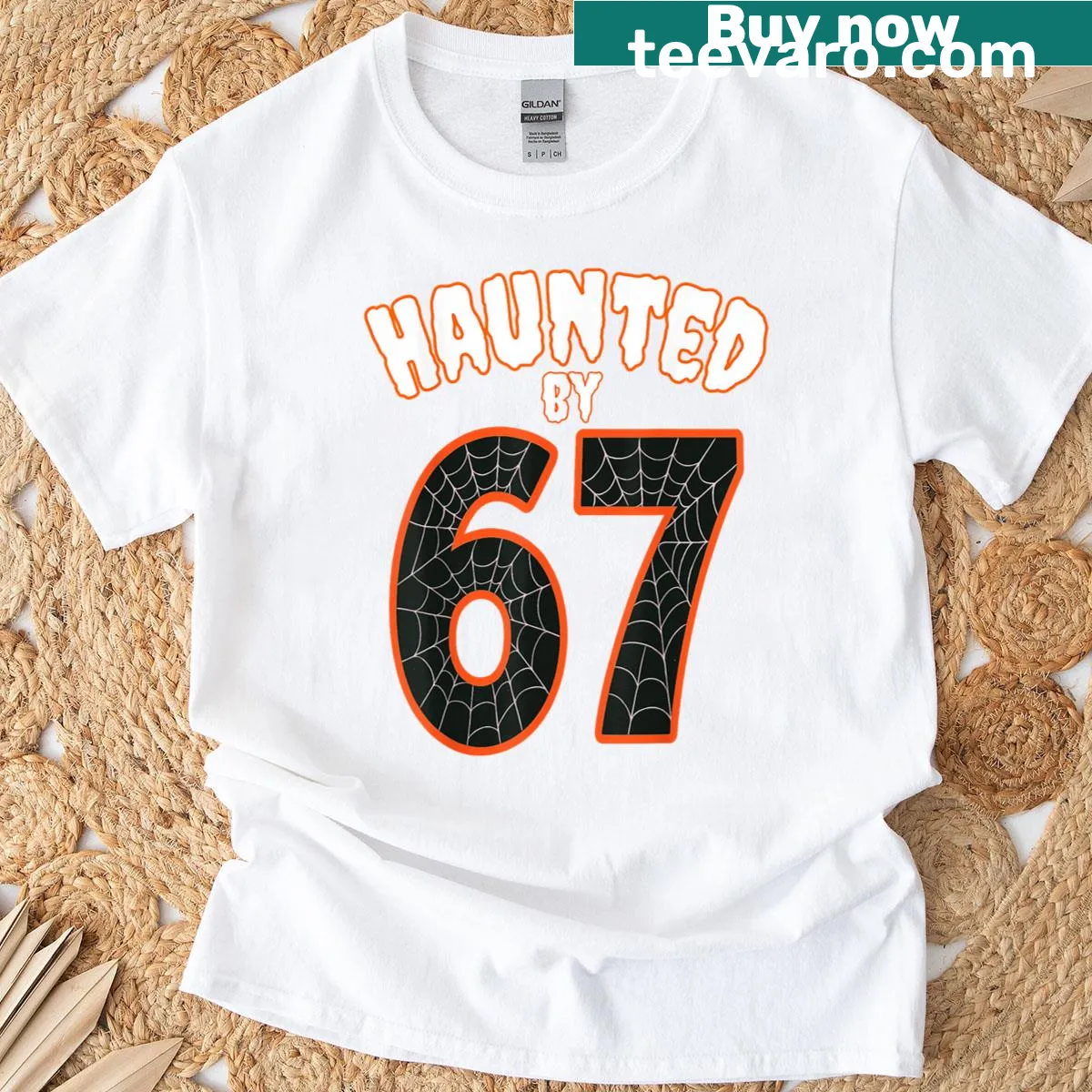 Funny Halloween t-shirt featuring the 67 meme text — on a men's t-shirt