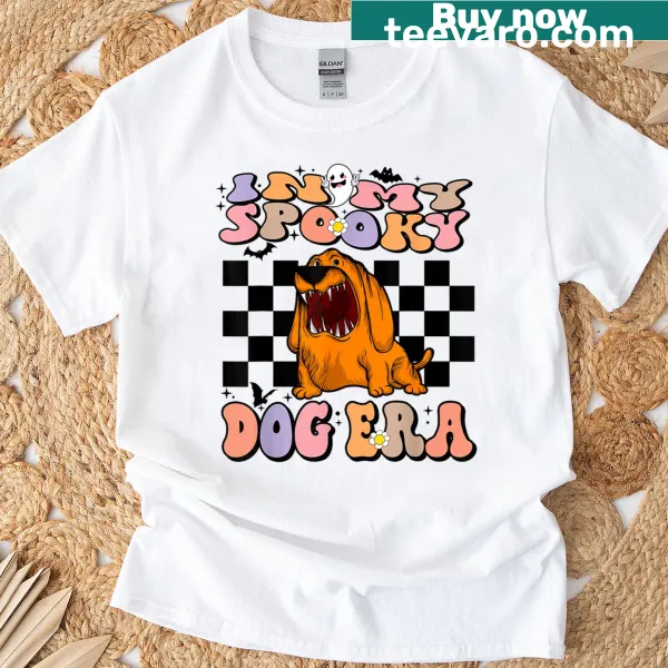 Cartoon dogs in Halloween costumes graphic T-shirt.