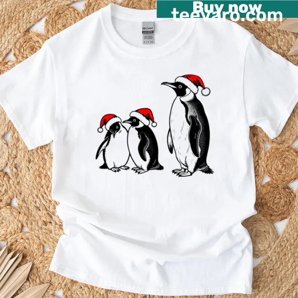 Cartoon penguin wearing a Christmas hat graphic T-shirt