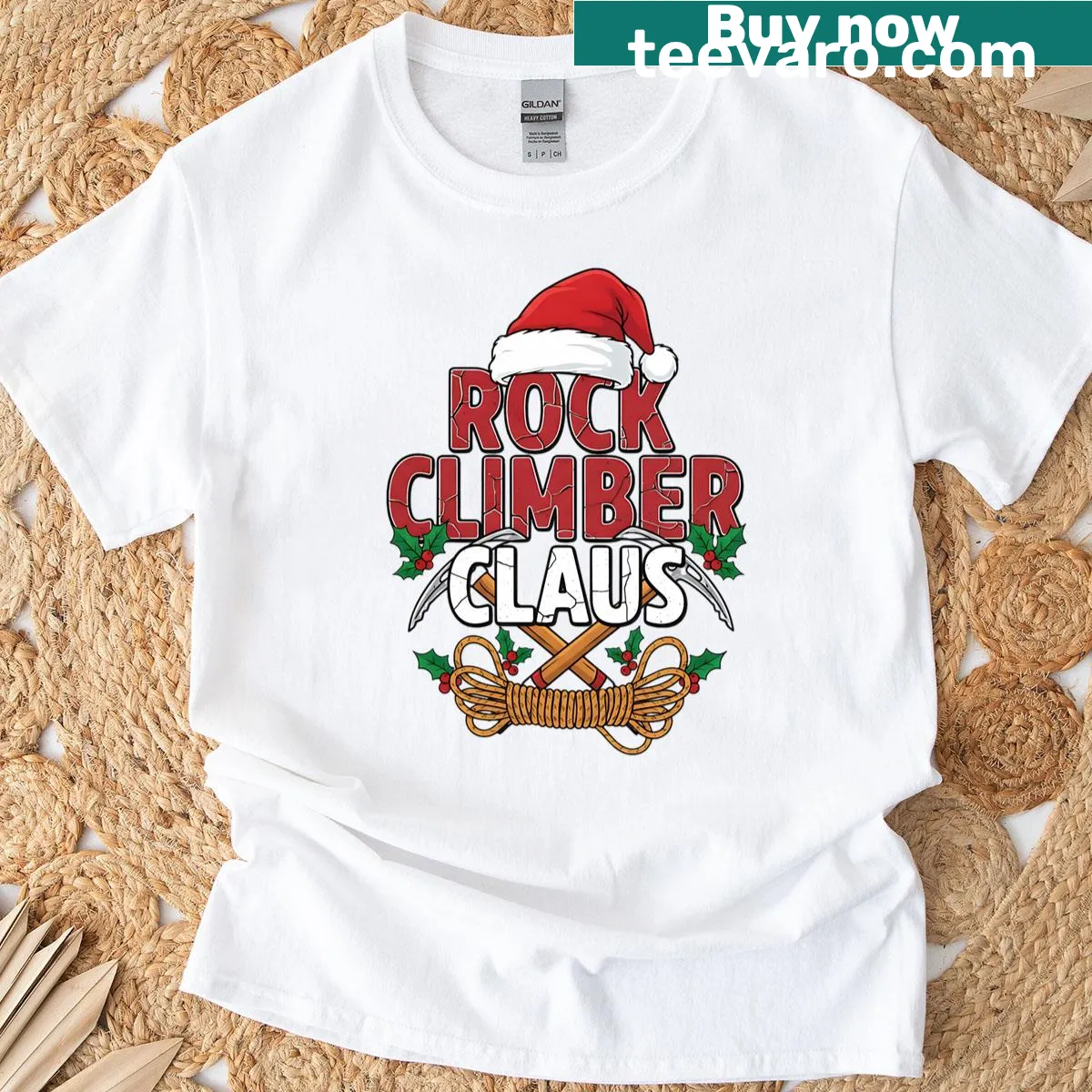 Holiday-themed t-shirt featuring a climbing Santa Claus. — on a men's t-shirt