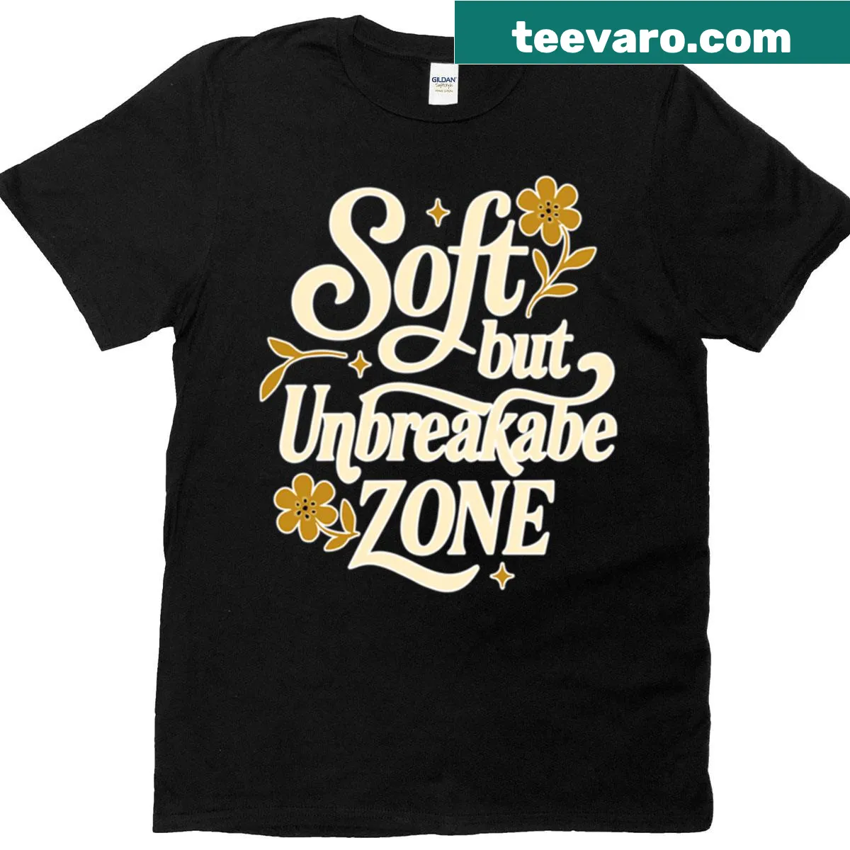 Empowering floral typography t-shirt with 'Soft But Unbreakable Zone' text — on a men's t-shirt