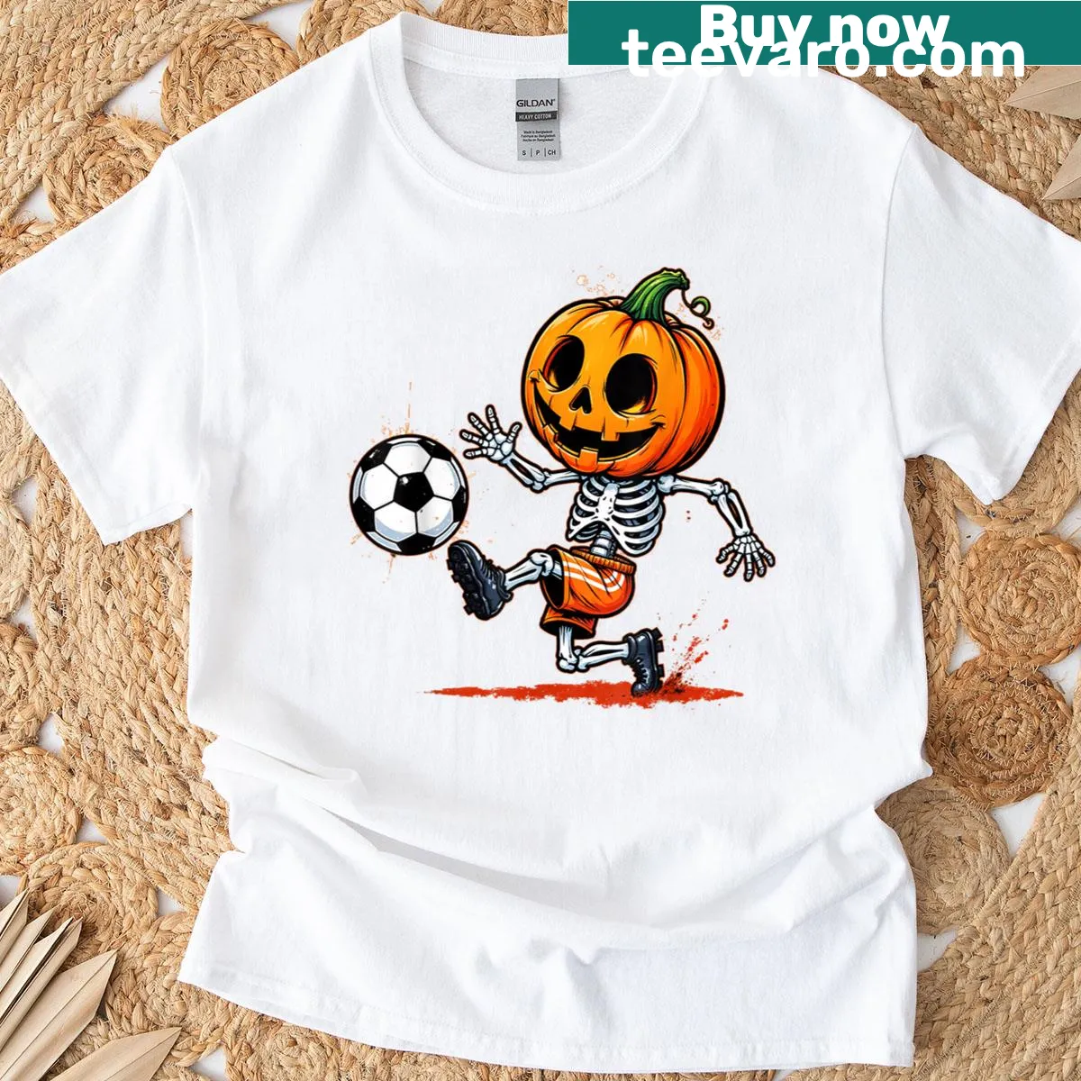 Funny pumpkin skeleton playing soccer for Halloween T-shirt — on a men's t-shirt