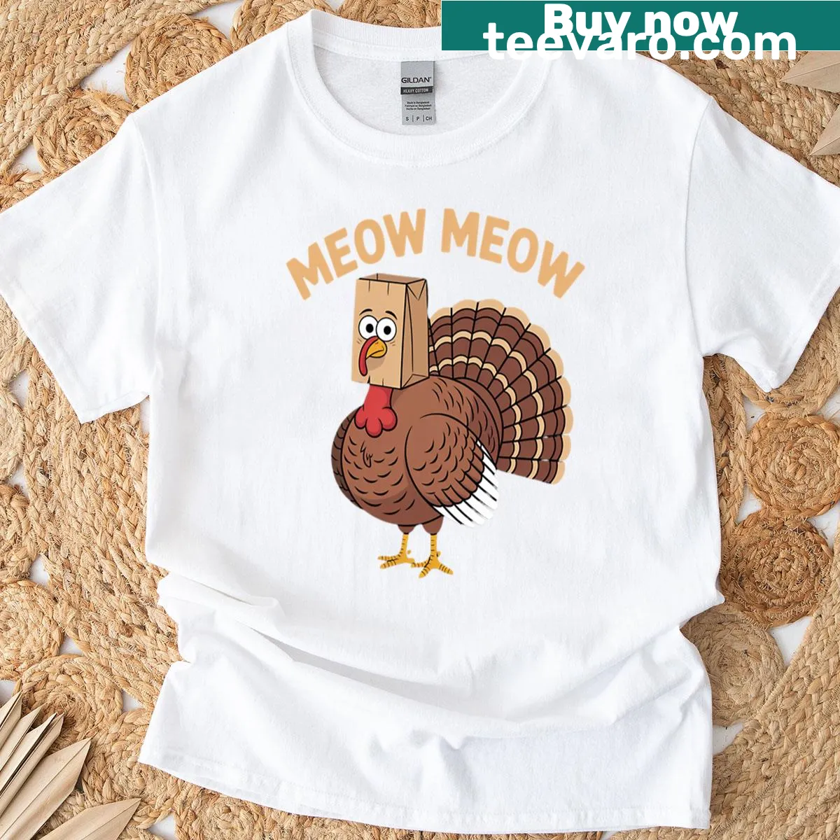 Funny Thanksgiving t-shirt featuring a cat and turkey graphic. — on a men's t-shirt