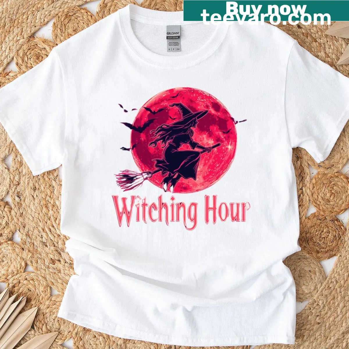 Flying witch under a red moon Halloween-themed t-shirt — on a men's t-shirt