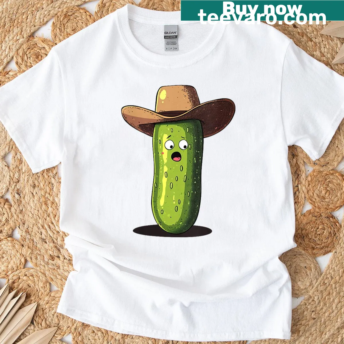 Funny T-shirt featuring a cartoon pickle in a cowboy hat — on a men's t-shirt