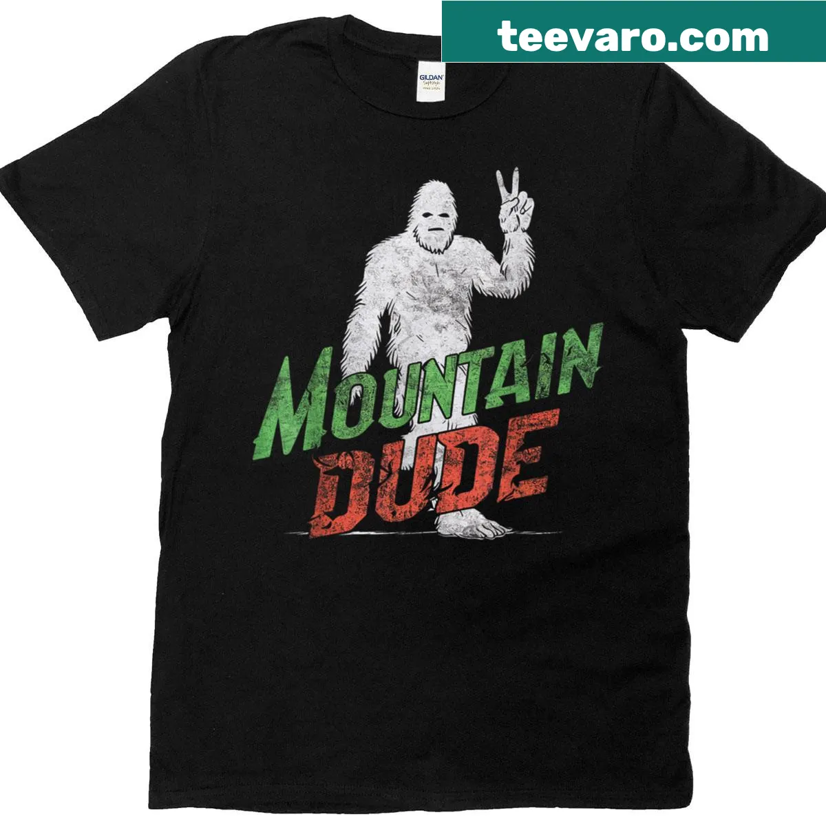 Vintage Sasquatch T-shirt featuring a whimsical Bigfoot design in a mountain setting. — on a men's t-shirt