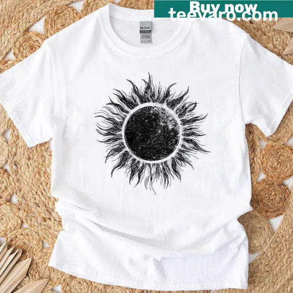 Vintage boho-style t-shirt featuring a sunflower and celestial designs