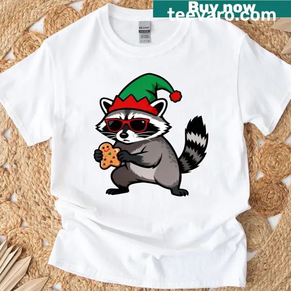 Cute Christmas T-shirt featuring a raccoon dressed as Santa Claus in a cartoon style.
