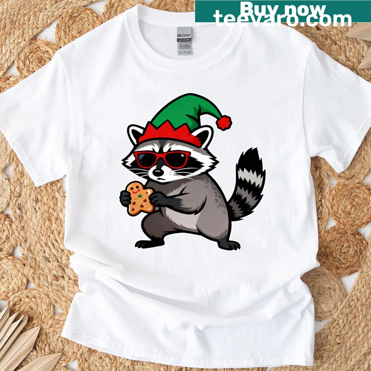 Cute Christmas T-shirt featuring a raccoon dressed as Santa Claus in a cartoon style. — on a men's t-shirt
