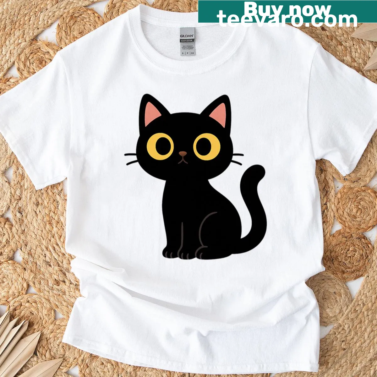 Minimalist design T-shirt with a cute black cat and yellow eyes — on a men's t-shirt