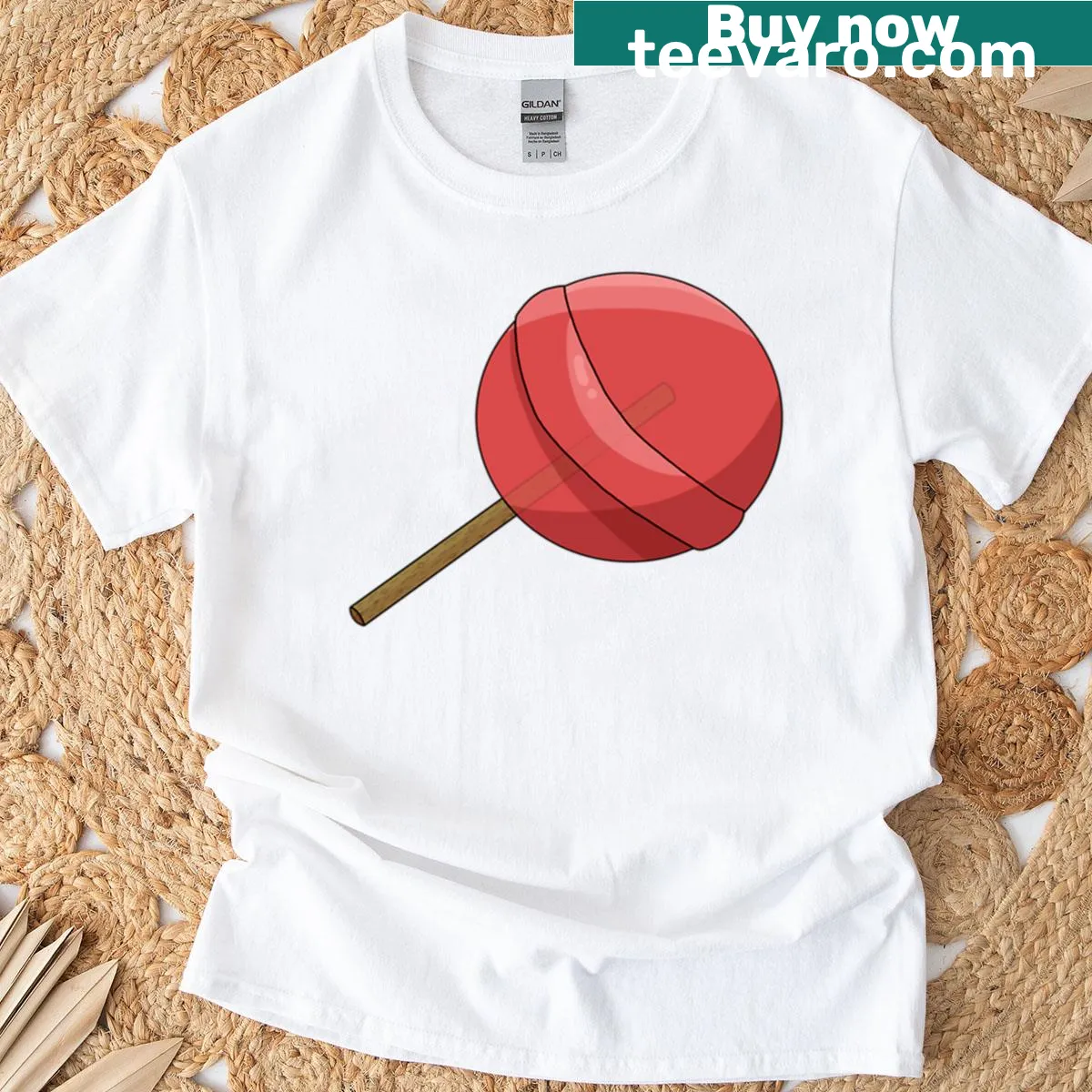 Whimsical T-shirt featuring a cute lollipop illustration — on a men's t-shirt
