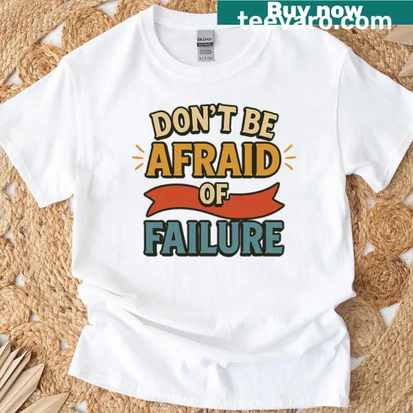 Inspirational quote graphic about overcoming fear of failure on T-shirt