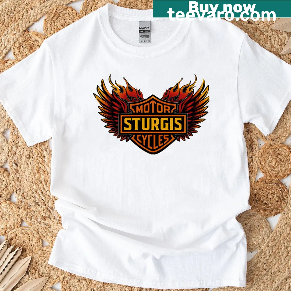 Sturgis Motorcycle Rally 2026 shirt with flaming wings design — on a men's t-shirt