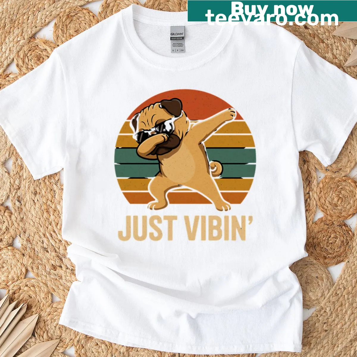 Illustration of a relaxed pug with 'Just Vibin' text on a t-shirt — on a men's t-shirt