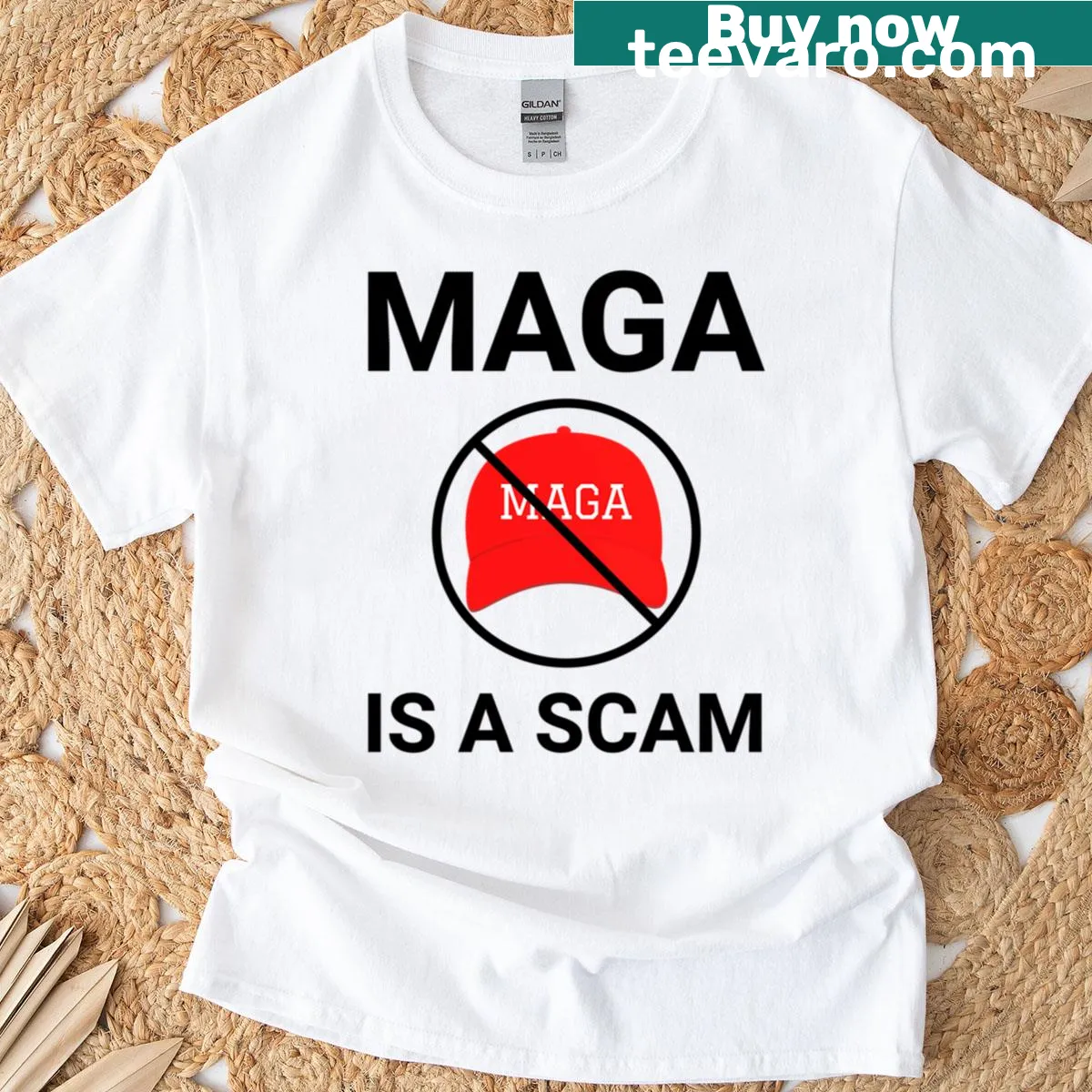 T-shirt with the text 'Maga Is A Scam' in bold typography — on a men's t-shirt