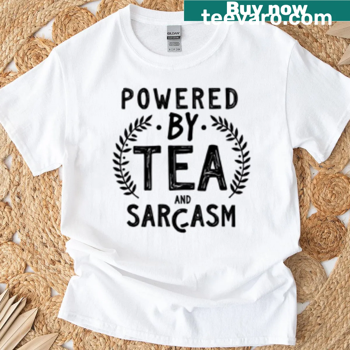 Sarcastic t-shirt with the phrase 'Powered By Tea' in a playful design — on a men's t-shirt