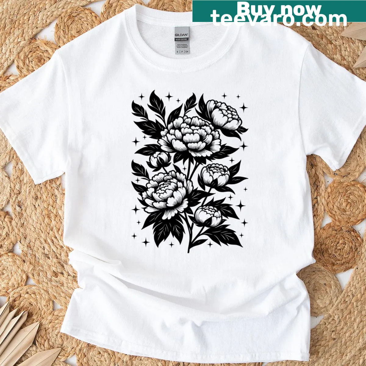 Vintage linocut flower design on a relaxed t-shirt. — on a men's t-shirt