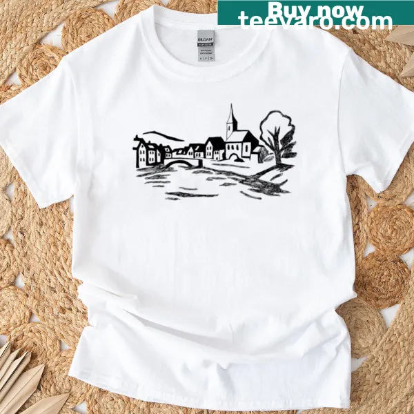 Shirt with serene river town illustration, showcasing nature's beauty.