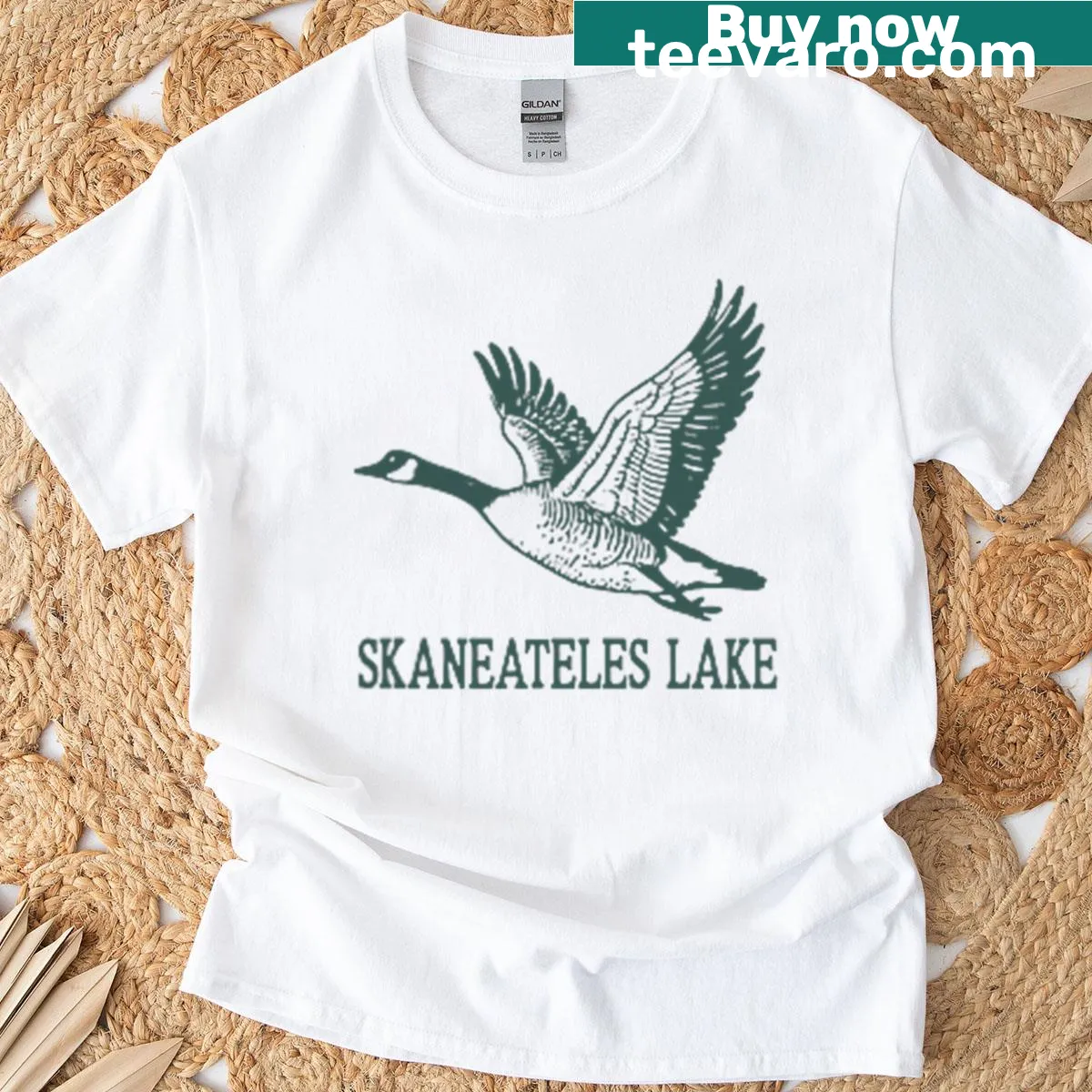 Vintage Skaneateles Lake T-shirt featuring a rustic outdoor graphic — on a men's t-shirt