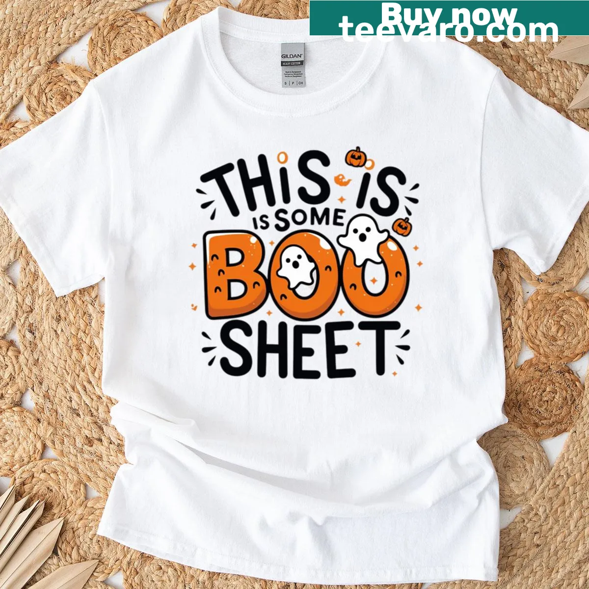 Funny Halloween T-shirt with a ghost and the phrase 'This Is Some Boo Sheet'. — on a men's t-shirt