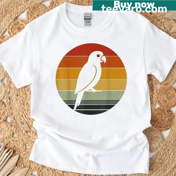 Vintage parrot illustration against a sunset graphic T-shirt
