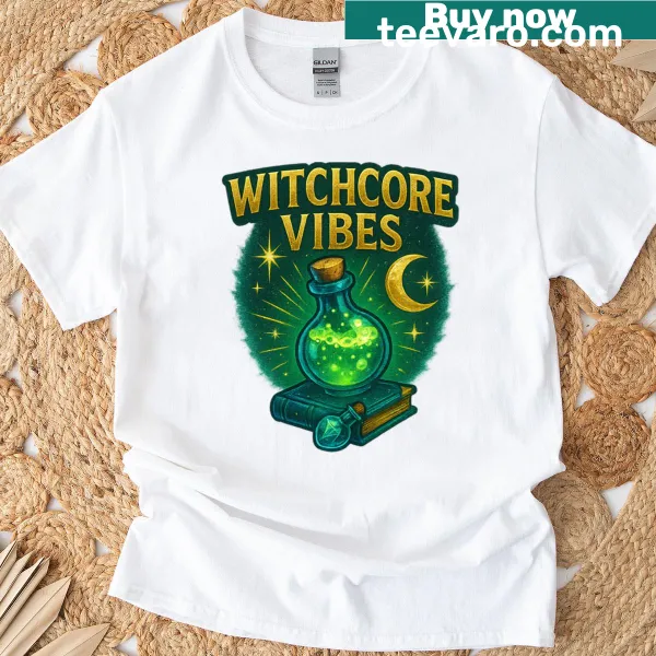 Illustrated T-shirt featuring potion bottles and books with a witchcore aesthetic