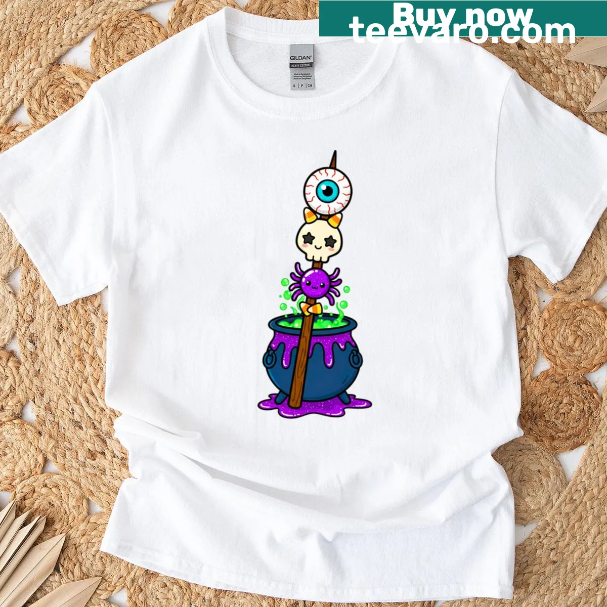 Cute Halloween t-shirt with a witch's cauldron and skewer — on a men's t-shirt