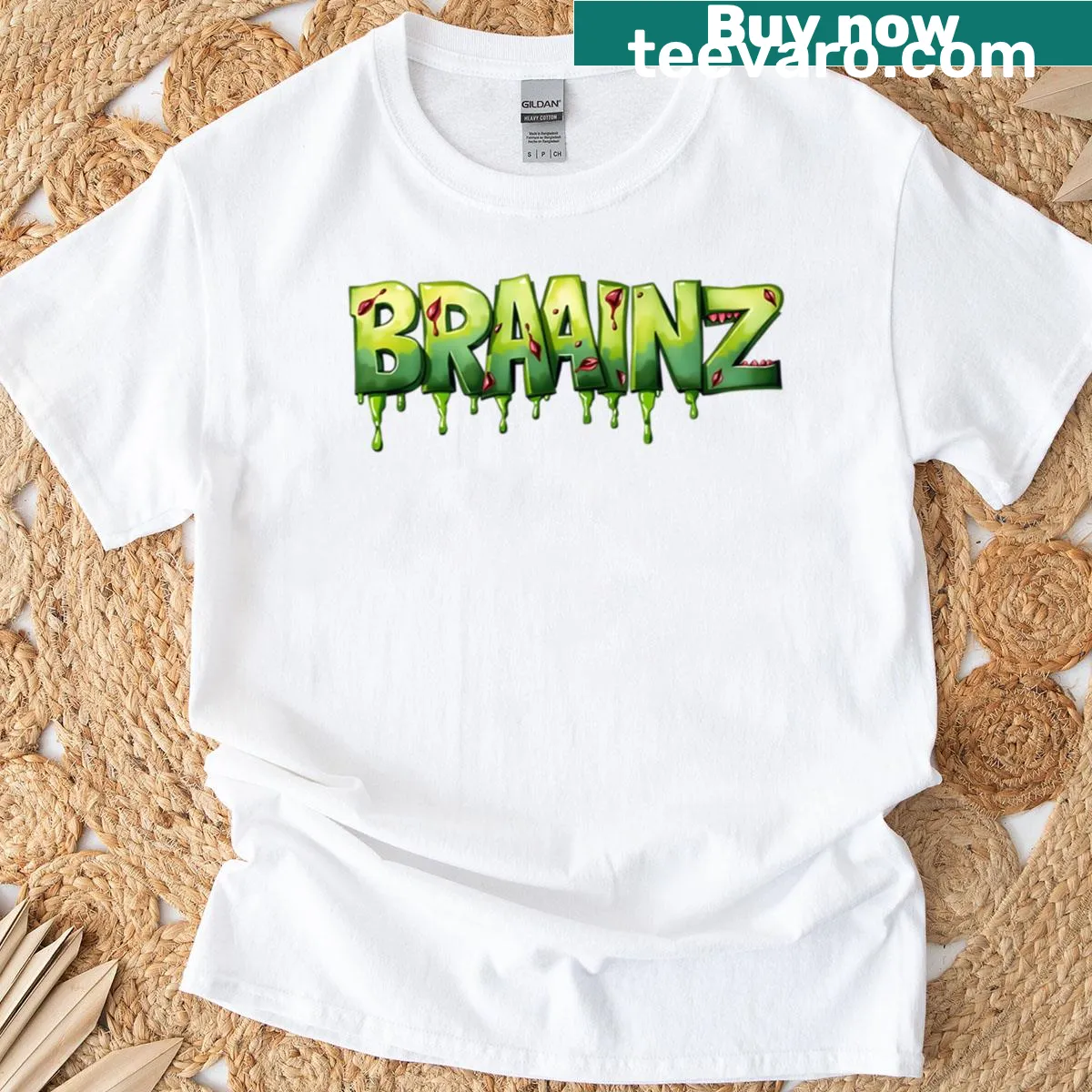 Cartoon-style t-shirt featuring zombie brainz and bite marks in humorous typography — on a men's t-shirt