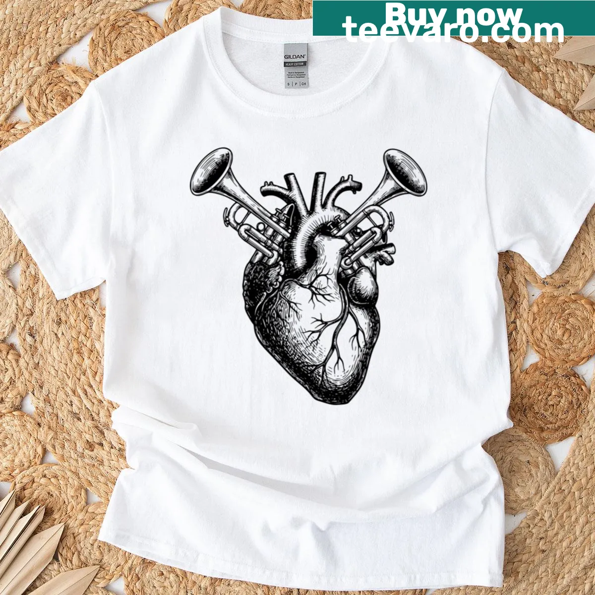Surreal anatomical heart and trumpet illustration graphic tee — on a men's t-shirt