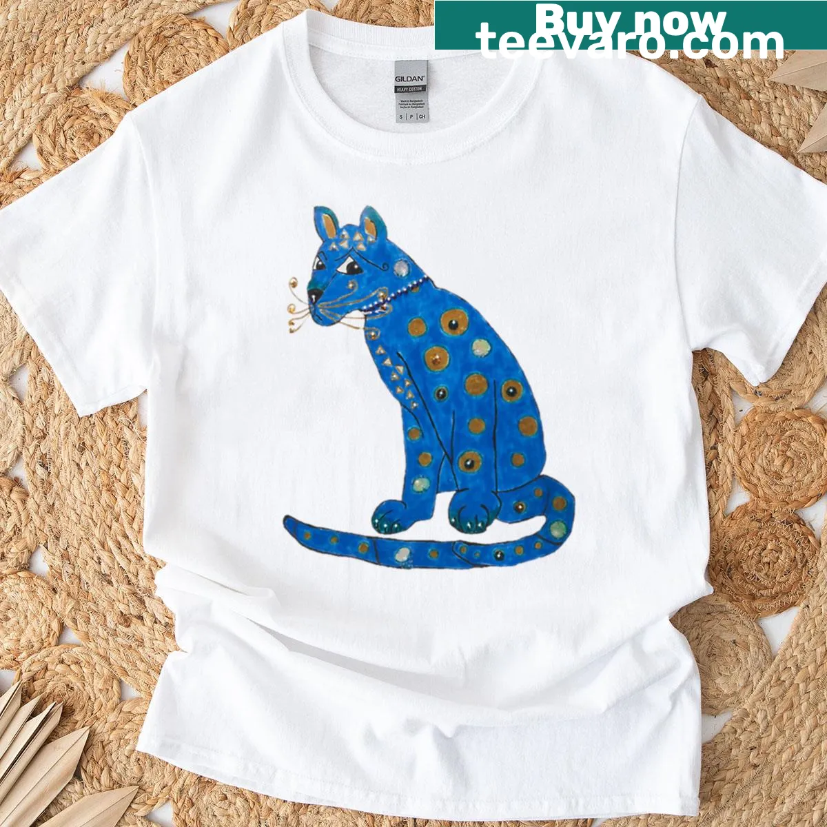 Illustrative blue cat graphic on a playful t-shirt — on a men's t-shirt