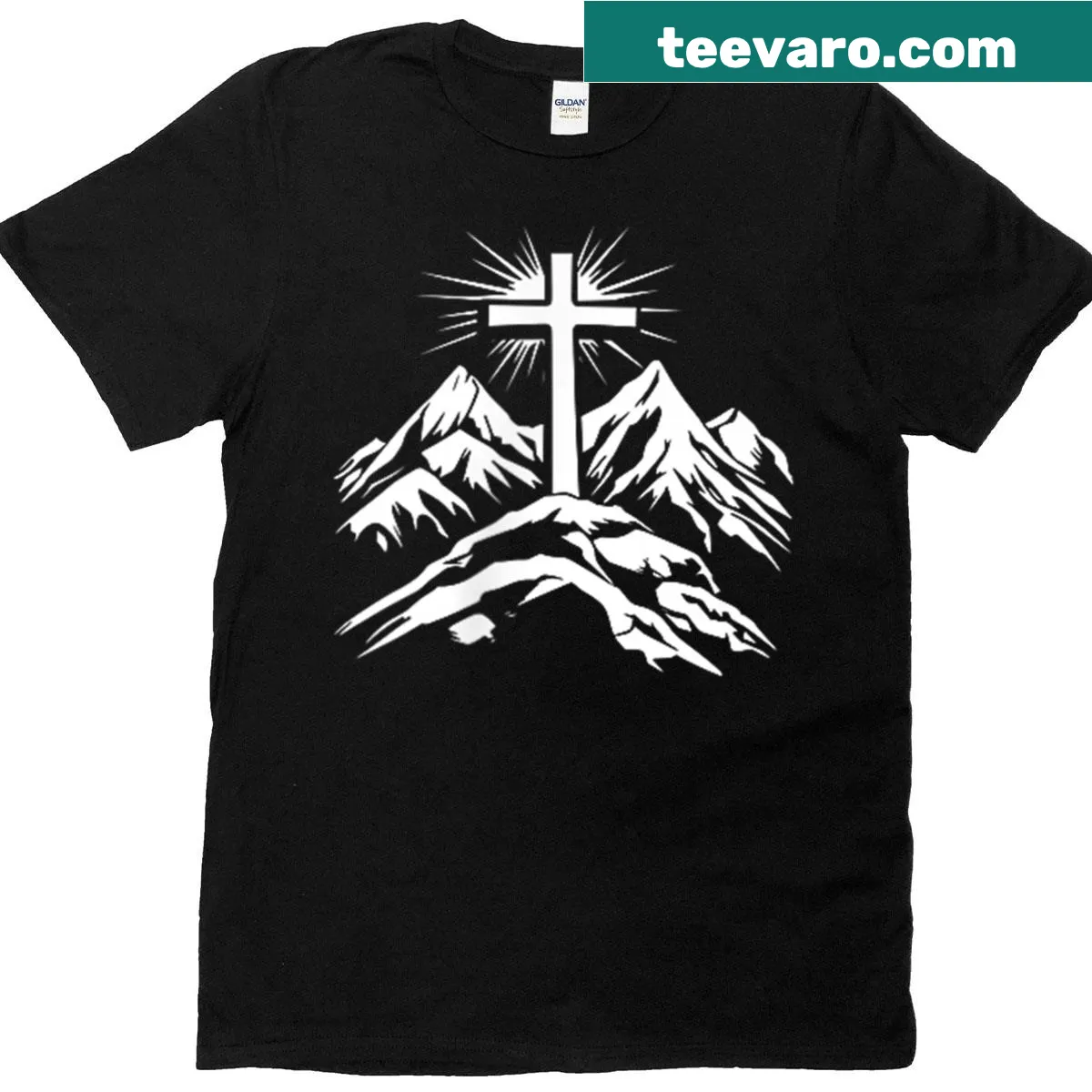 T-shirt featuring a cross and mountain illustration — on a men's t-shirt