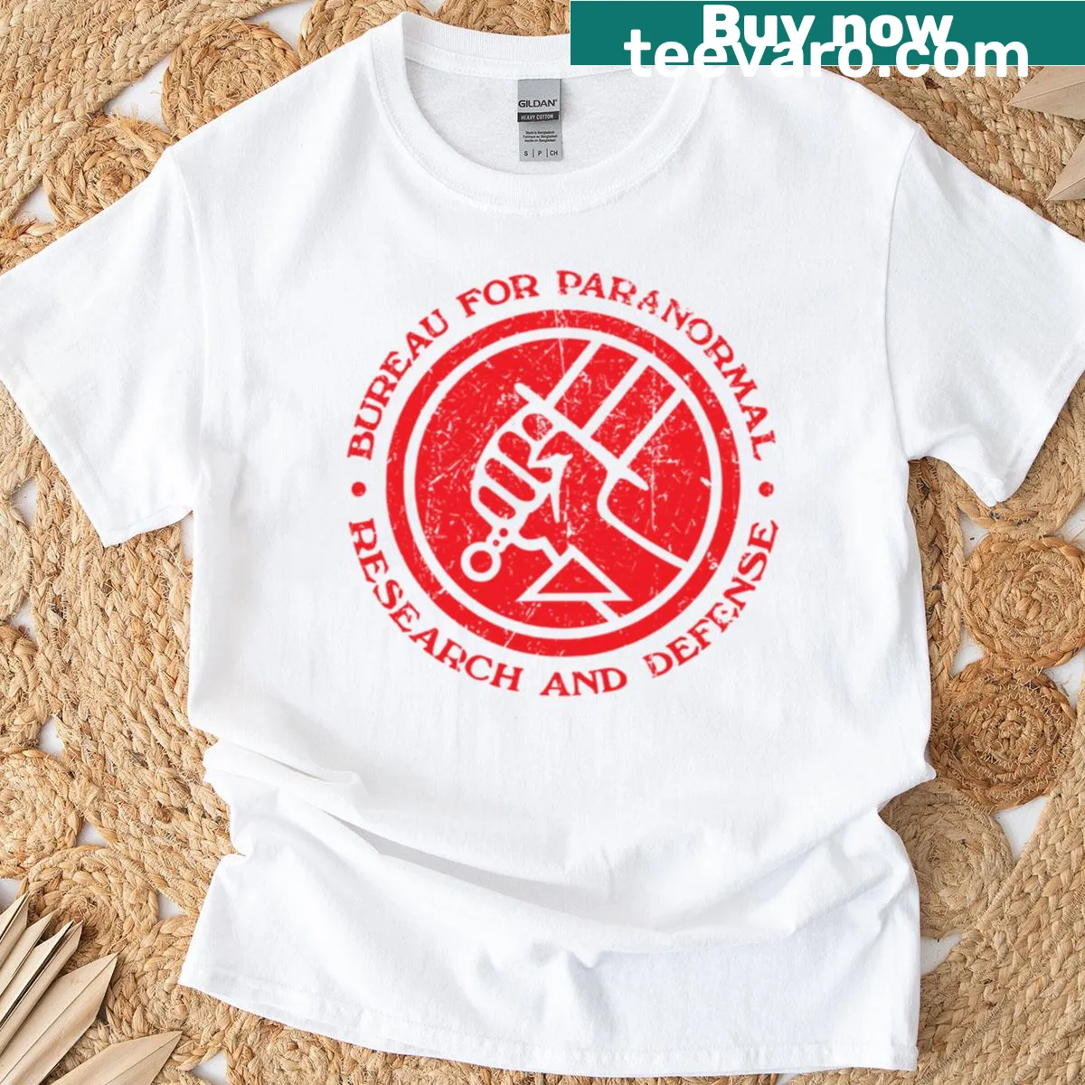 Distressed graphic t-shirt featuring Hellboy and paranormal themes — on a men's t-shirt