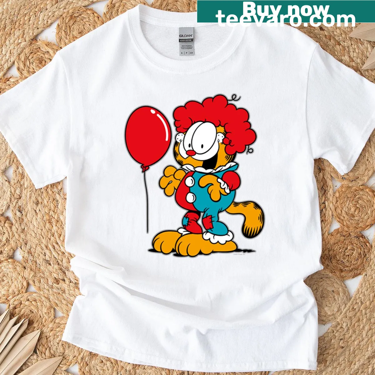 T-shirt featuring Garfield in a clown costume with a red balloon for Halloween. — on a men's t-shirt