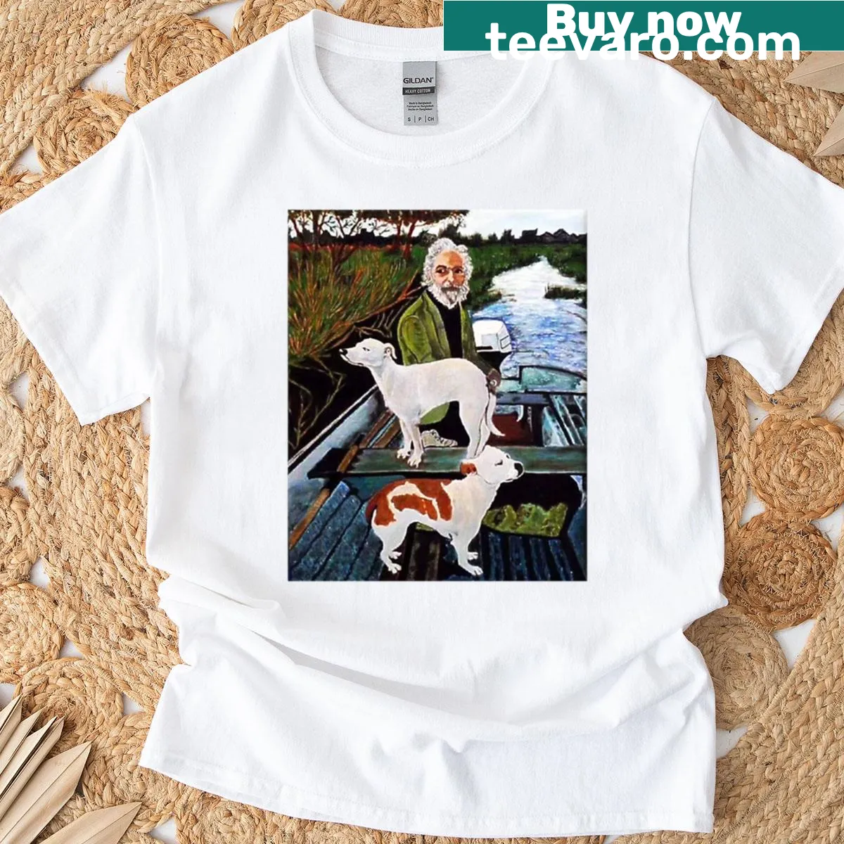 Illustrated t-shirt featuring a man with two dogs in a warm scene. — on a men's t-shirt